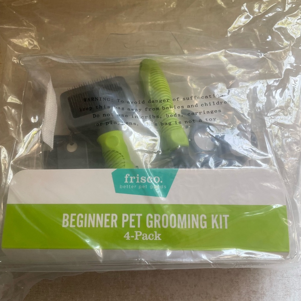 Brand new 4 piece cat grooming kit